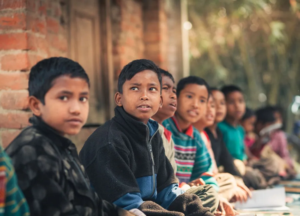 Children attending an outdoor class in rural Bangladesh